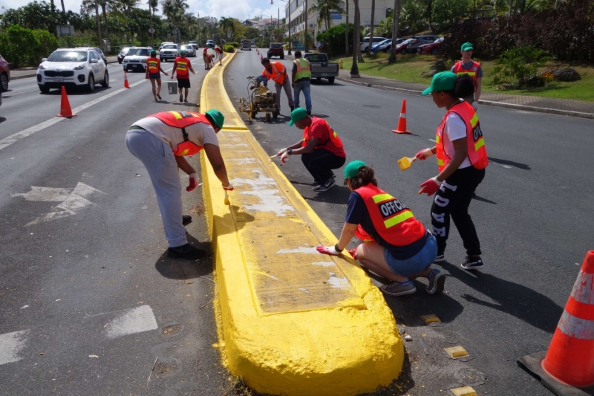 The Guam Visitors Bureau (GVB) has teamed up with the Department of Public Works (DPW) and volunteers from the Andersen Air Force Base Sister Village Program to water blast and paint medians as part of efforts to beautify and improve traffic safety in Tumon.

“GVB provided the supplies for this project, while DPW assisted with traffic control and additional manpower,” said Acting President and CEO Bobby Alvarez. “We thank DPW and the 17 volunteers from Andersen Air Force Base for their help with the median improvement project. This truly was a community partnership. We have plans to continue median and crosswalk painting into Tamuning and Hagatña in the coming weeks.”

The cost was about $20K for supplies and equipment rental. The project began April 15th and was from the Archbishop Flores Rotunda to the Westin Hill.