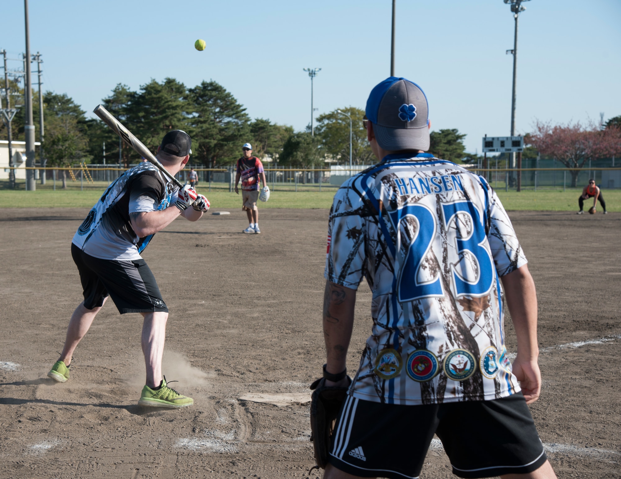U.S. Air Force 35th Security Forces Squadron members square off against the 35th Medical Operations Squadron during the 2019 Cinco de Mayo softball tournament at Misawa Air Base, Japan, May 4, 2019. This softball tournament helped bolster teamwork and relations between different units through a sporting event. (U.S. Air Force photo by Branden Yamada)