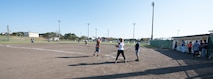 The 35th Security Forces Squadron and 35th Medical Operations Squadron compete in a match during the 2019 Cinco de Mayo softball tournament at Misawa Air Base, Japan, May 4, 2019.  Both teams played the opening match for the tournament, garnering spectators and supporting relations with neighboring units on Misawa Air Base. (U.S. Air Force photo by Branden Yamada)