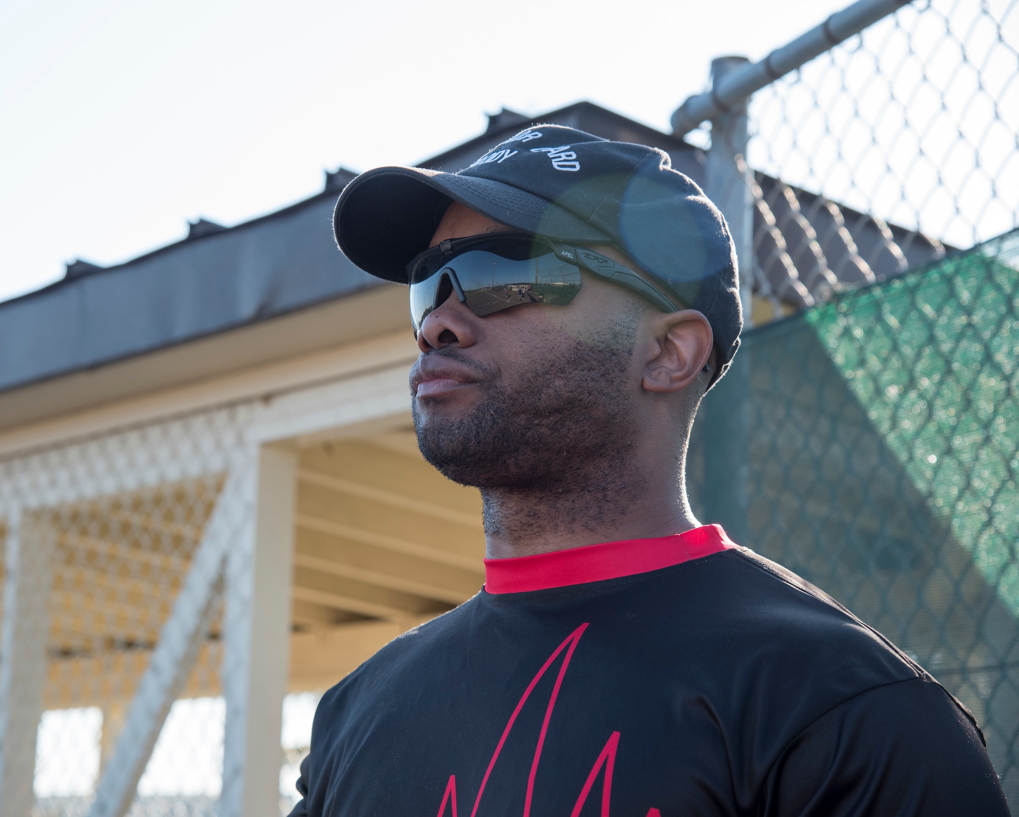 U.S. Air Force Master Sgt. Malcolm Sharpe, the 35th Medical Operations Squadron mental health clinic NCO in charge, keeps his eyes on a game during the 2019 Cinco de Mayo softball tournament at Misawa Air Base, Japan, May 4, 2019. The tournament is one of many sporting events held on Misawa AB, promoting teamwork and helping Airmen meet others on the base. (U.S. Air Force photo by Branden Yamada)