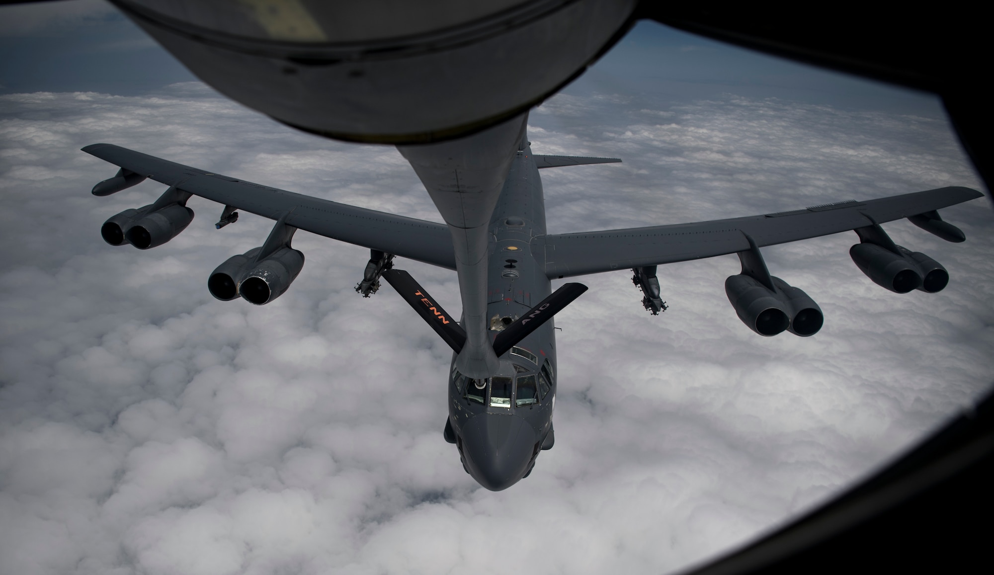 A photo of a B-52 bomber refueling in midair.