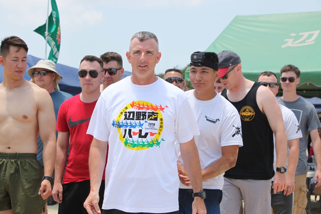 A team from Camp Schwab, led by Col. Jason S.D. Perry, Camp Schwab commanding officer, prepare to start a race in the men’s division competition. Members of the local and U.S. communities on Okinawa took part in Dragon Boat Races May 12, 2019, in Henoko, Okinawa, Japan.