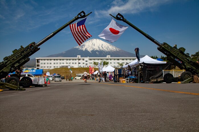 U.S. Marines display the American and Japanese flag attached to the M777’s for the Friendship Festival May 11, 2019, on Combined Arms Training Center Camp Fuji, Shizuoka, Japan. The local community, Japanese Ground Self-Defense Force, and U.S. service members experience a day dedicated to Japanese and Marine Corps tradition and culture events.