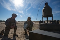 U.S. Marine Corps Cpl. Austin Brown and Pfc. Elias Cruz with Alpha Company, 8th Engineer Support Battalion, 2nd Marine Logistics Group trigger a 40 pound shape charge at Camp Lejeune, North Carolina, Feb. 7, 2019. Marines held the demolition familiarization range to sustain critical engineering knowledge and techniques. (U.S. Marine Corps photo by Lance Cpl. Scott R. Jenkins)