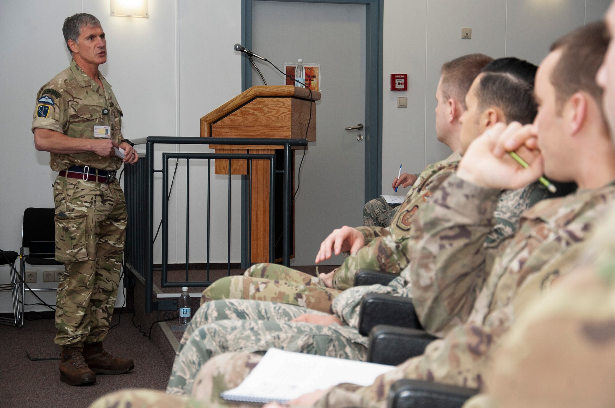 Chief Warrant Officer Jake Alpert, command senior enlisted advisor for NATO Allied Air Command, speaks to junior noncommissioned officers during the Atlantic Stripe.