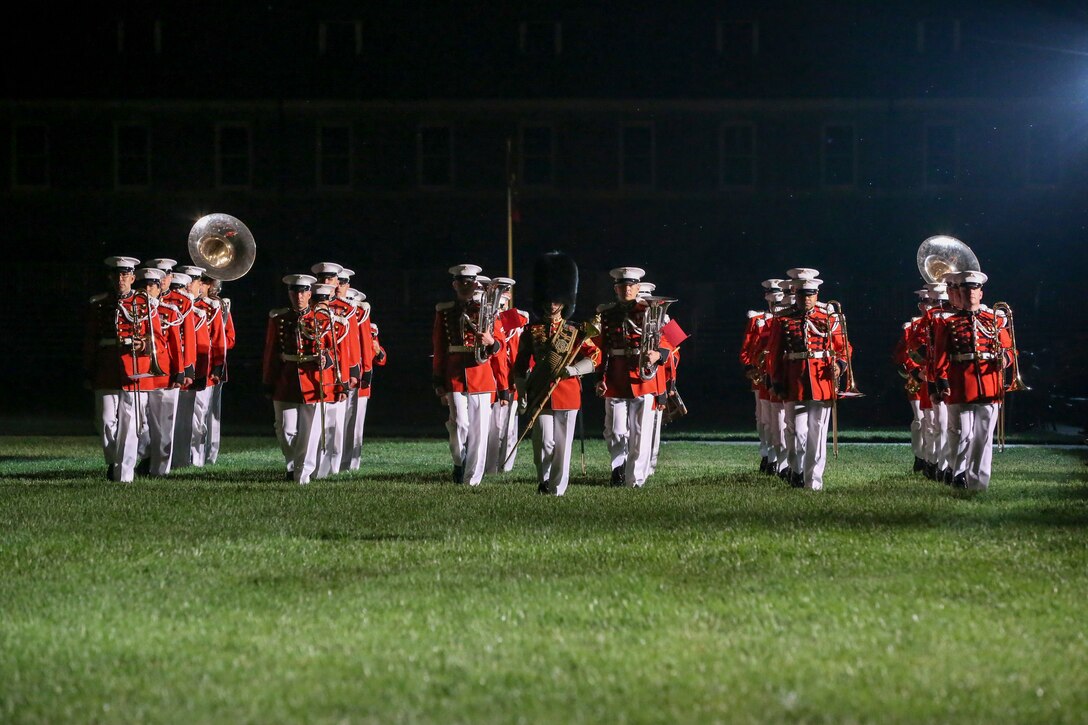 Marines with “The President’s Own,” U.S. Marine Band, march in formation during a Friday Evening Parade at Marine Barracks Washington, D.C., May 10, 2019.The guest of honor for the parade was the Honorable, David L. Norquist, Under Secretary of Defense (Comptroller)/Chief Financial Officer and performing the duties of the Deputy Secretary of Defense, and the hosting official was the Assistant Commandant of the Marine Corps, Gen. Gary L. Thomas. (U.S. Marine Corps photo by Pfc. Allen Sanders)