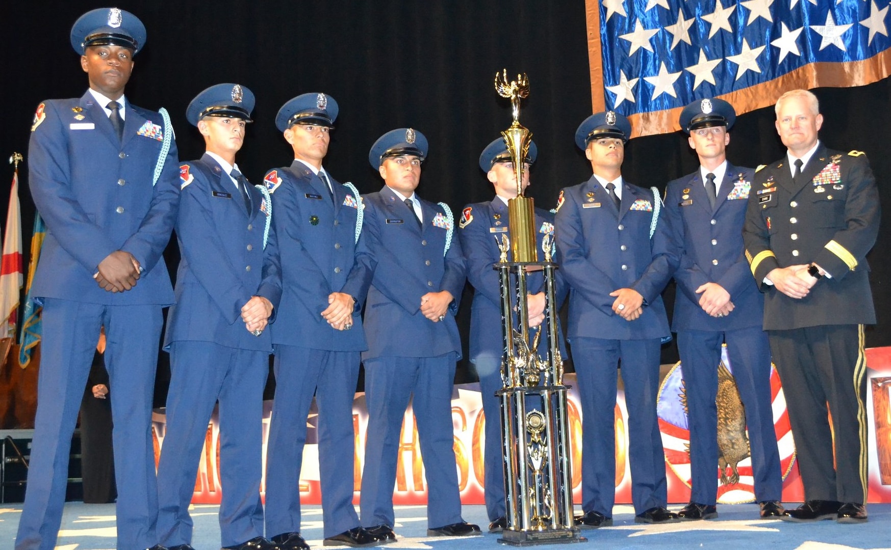 The John Jay Silver Eagles from Jay High School in San Antonio stand together after winning their fourth national title in five years at the National High School Drill Team Competition, May 3-5, 2019, at Daytona Beach, Florida. The competition was a three-day event where 68 Junior Reserve Officer Training Corps drill teams from all services compete against one another for titles in more than 50 events. U.S. Army Maj. Gen. John R. Evans Jr. (right), Army Cadet Command commander, presented the Silver Eagles’ trophy during the award ceremony. In total, John Jay High School took home 22 trophies from the competition.