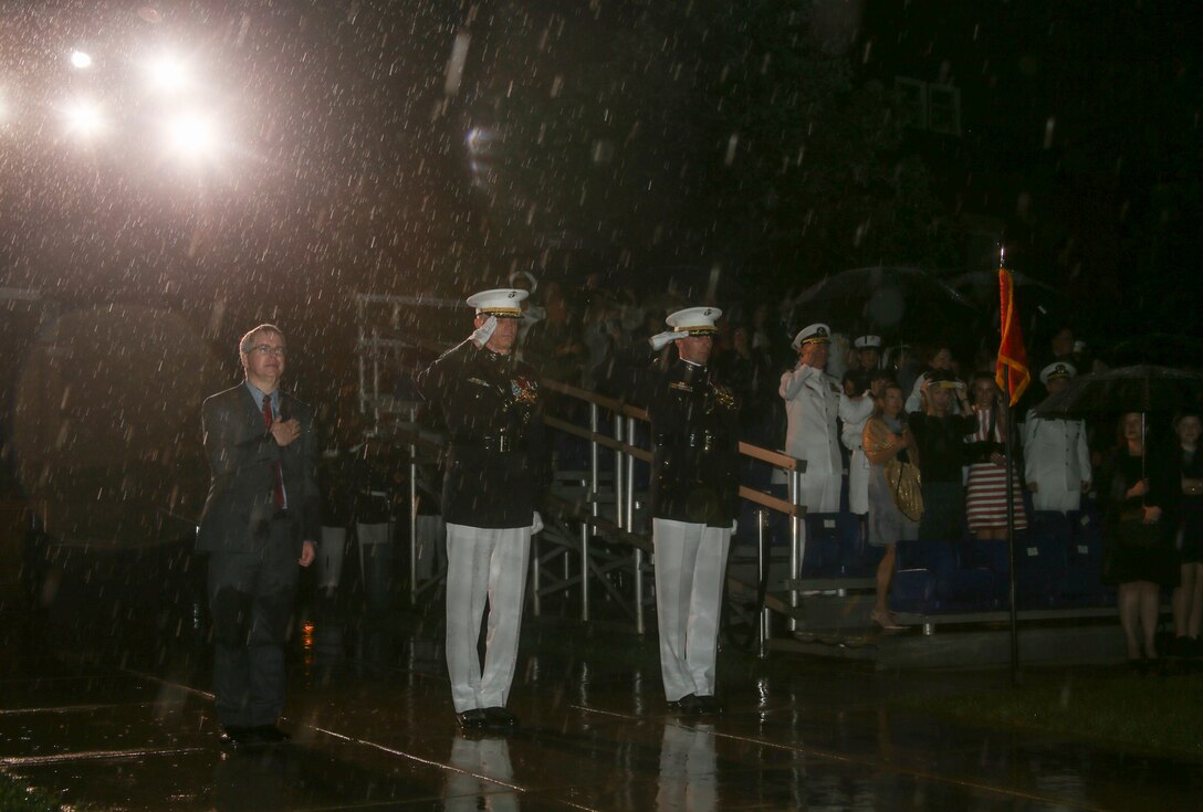 The Honorable, David L. Norquist, Under Secretary of Defense (Comptroller)/Chief Financial Officer and performing the duties of the Deputy Secretary of Defense, left, Assistant Commandant of the Marine Corps, Gen. Gary L. Thomas, middle, and Col. Donald J. Tomich, commanding officer, Marine Barracks Washington D.C., right, render honors for “honors” during a Friday Evening Parade at the Barracks, May 10, 2019. The guest of honor for the parade was the Honorable, David L. Norquist, Under Secretary of Defense (Comptroller)/Chief Financial Officer and performing the duties of the Deputy Secretary of Defense, and the hosting official was the Assistant Commandant of the Marine Corps, Gen. Gary L. Thomas. (U.S. Marine Corps photo by Sgt. Robert Knapp/Released)