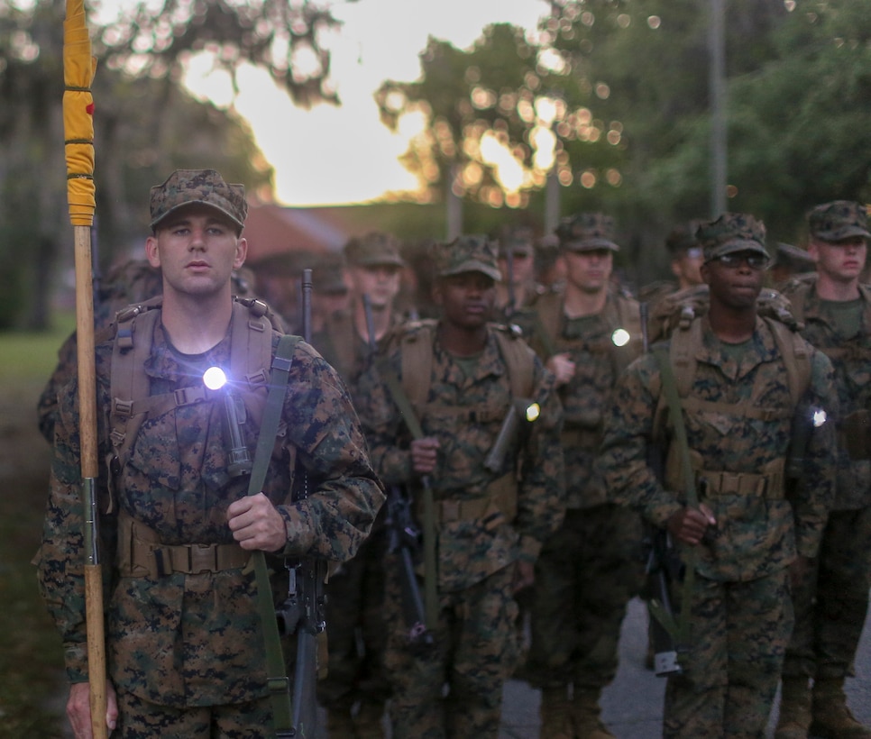 Recruits with Alpha Company, 1st Recruit Training Battalion, conduct a 5K Hike on Apr 20, 2019 on Marine Corps Recruit Depot Parris Island, S.C. The recruits will conduct five hikes of increasing difficulty before culminating in a 15K hike during the Crucible. Today approximately 19,000 recruits come to Parris Island annually for the chance to become United States Marines by enduring 12 weeks of rigorous, transformative training. (U.S. Marine Corps photo by Cpl. Daniel O'Sullivan/Released)