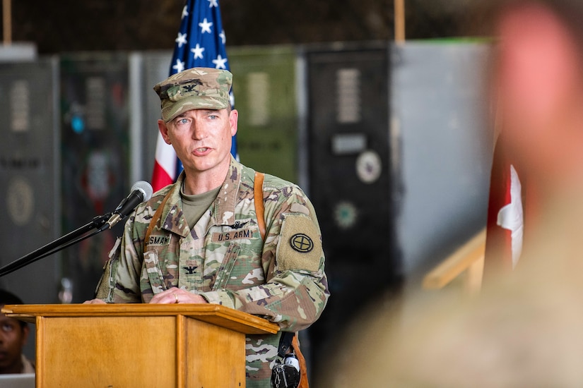 U.S. Army Col. Charles Hausman, commander of the 35th Combat Aviation Brigade, Missouri Army National Guard, addresses Soldiers during a transfer of authority ceremony in an aircraft hangar in Taji, Iraq, May 1, 2019.  The 35th CAB supports Combined Joint Task Force – Operation Inherent Resolve and Operation Spartan Shield.  CJTF-OIR works with partner forces to defeat Daesh in designated areas and set conditions for follow-on operations to increase regional stability.