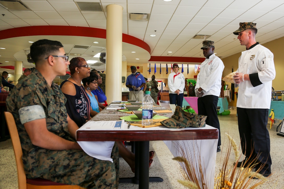 Sgt. Stephen J. Van Hout, a Quality Assurance Evaluator with the Parris Island Mess Halls aboard Marine Corps Recruit Depot, South Carolina, presents a prepared meal for a panel of judges at Mess Hall 280 on Marine Corps Air Station Beaufort, S.C., May 2, 2019.  The food was prepared during a “Chef of the Quarter” event that includes mess halls from MCAS Beaufort and Parris Island competing against one another for the top spot. Parris Island Mess Hall placed first and won the People’s Choice award. (U.S. Marine Corps photo by Cpl. Andrew Neumann)