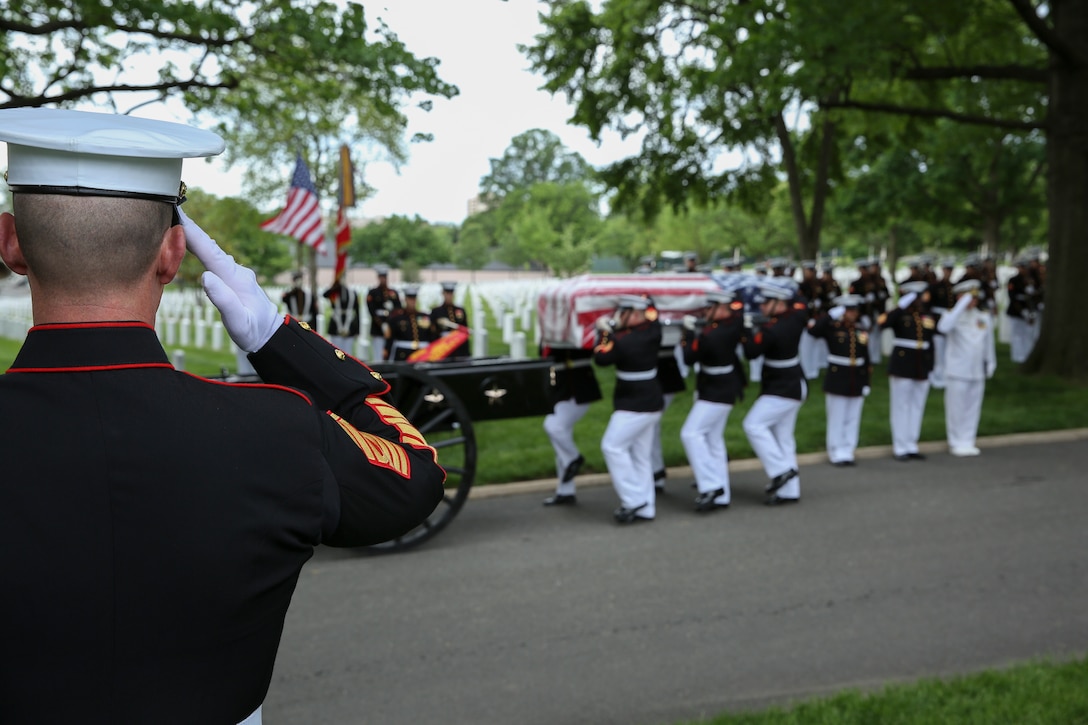 A Marine salutes the casket of Staff Sgt. Benjamin S. Hines during a full honors funeral for Hines at Arlington National Cemetery, Arlington, Virginia, May 10, 2019. Hines was killed in action on Monday April 8, 2019 in Afghanistan, alongside two of his fellow Marines while deployed with the 25th Marine Regiment, 4th Marine Division, Marine Forces Reserve. The unit deployed as a part of a NATO program to train and advise Georgian infrany troops. (U.S. Marine Corps photo by Sgt. Robert Knapp/Released)