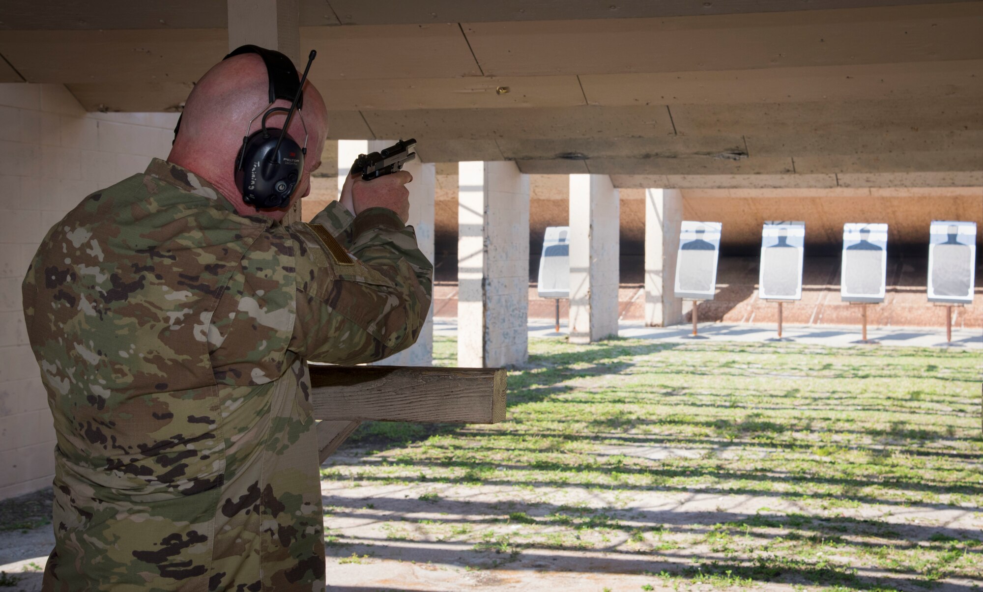 U.S. Air Force Maj. Gen. Sam Barrett, the 18th Air Force commander from Scott Air Force Base, Ill., participates in an M-9 pistol shooting competition, at MacDill AFB, Fla., May 9, 2019.