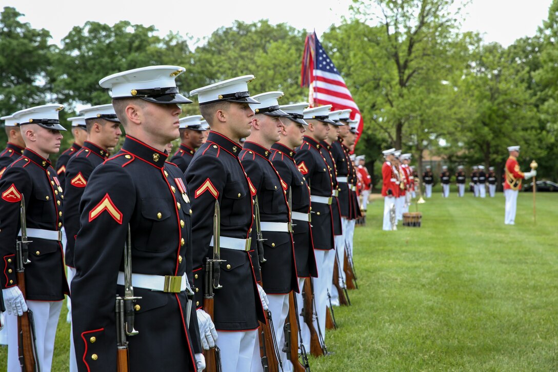 Marines with Marine Barracks Washington D.C. stand at attention during a full honors funeral for Staff Sgt. Benjamin S. Hines at Arlington National Cemetery, Arlington, Virginia, May 10, 2019. Hines was killed in action on Monday April 8, 2019 in Afghanistan, alongside two of his fellow Marines while deployed with the 25th Marine Regiment, 4th Marine Division, Marine Forces Reserve. The unit deployed as a part of a NATO program to train and advise Georgian infrany troops. (U.S. Marine Corps photo by Sgt. Robert Knapp/Released)