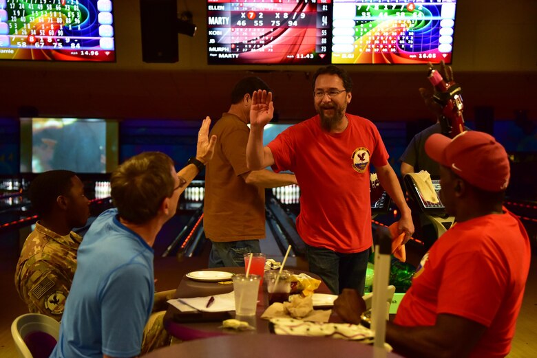 Team Little Rock members celebrate during Unite program.