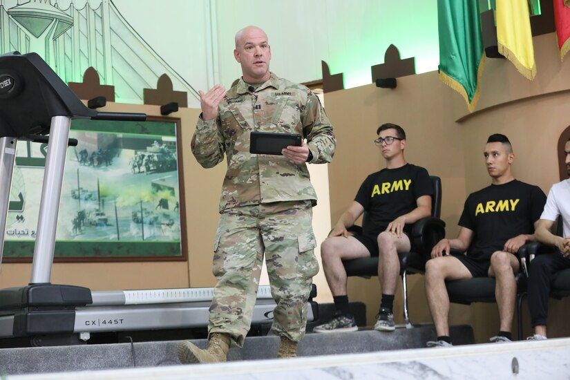 U.S. Army Capt. Anthony Williams, a physical therapist with 3rd Armored Brigade Combat Team, 4th Infantry Division, Task Force Spartan, demonstrates heel-strike running while presenting a lecture on proper running technique at the Kuwait National Guard headquarters on Tuesday, April 30, 2019. Williams was invited to share a running seminar that he regularly conducts with U.S. Soldiers with soldiers, new recruits, and trainers in the Kuwait National Guard.
