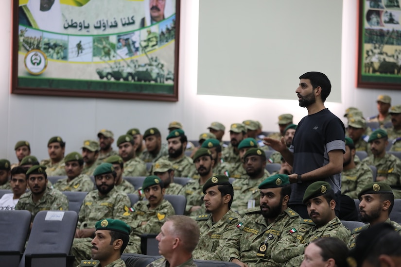 Audience members ask questions at a U.S. Army-led running lecture at the Kuwait National Guard headquarters on Tuesday, April 30, 2019. Leaders within the Kuwait National Guard invited U.S. Army Capt. Anthony Williams, a physical therapist with the 3rd Armored Brigade Combat Team, 4th Infantry Division, Task Force Spartan, to present a 90-minute lecture on proper running technique in order to help Kuwaiti soldiers prevent running-related injuries.