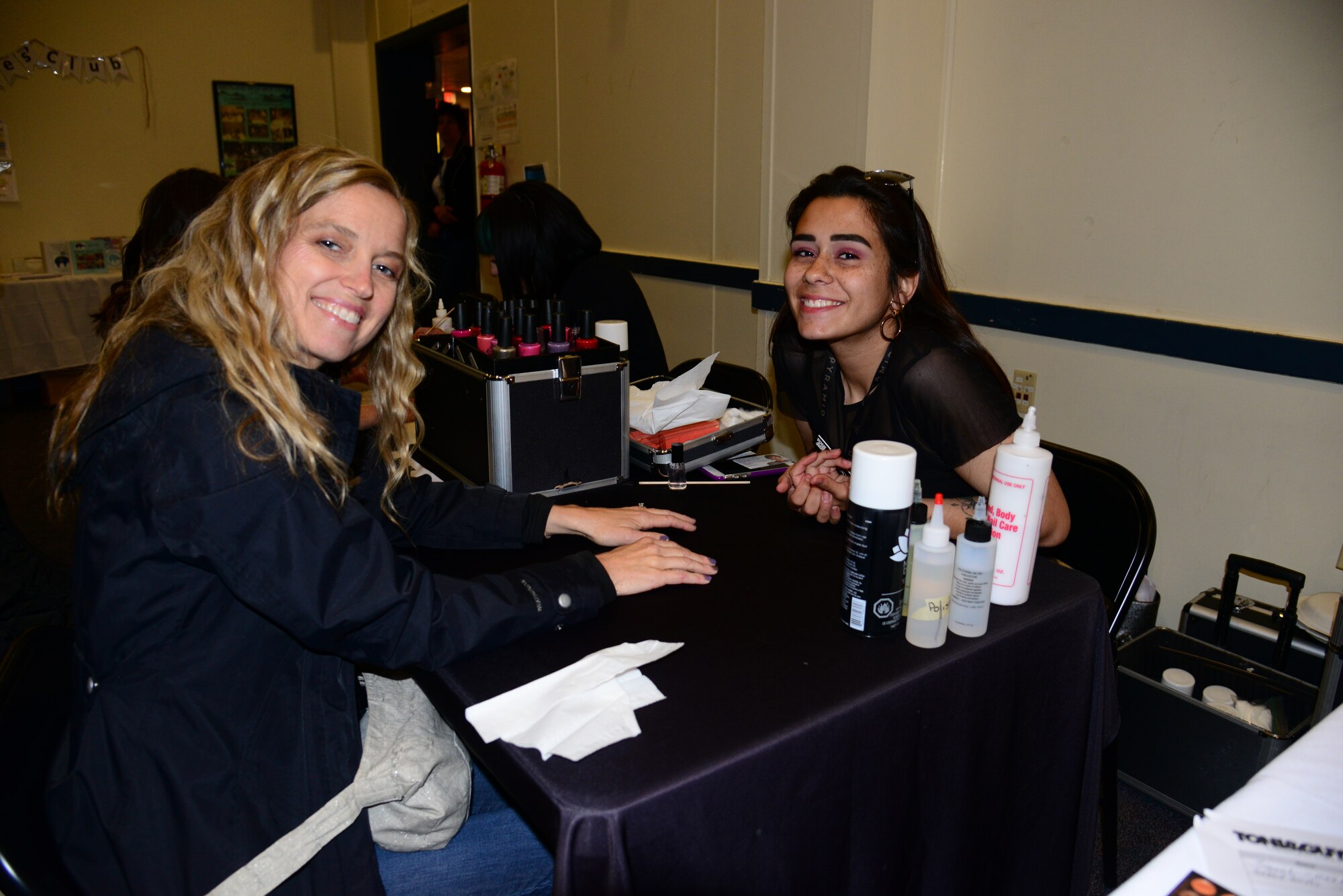 Nail technician Kimberly Jaramillo, Tony and Guy Salon Albuquerque, gives 58th Special Operations Wing military spouse, Kirstin Horne a manicure during a spouse appreciation event, May 10. The event included a morning of pampering with massages, makeovers, manicures, pedicures and beauty consultants.  The President of the United States designated the Friday before Mother's Day as "Military Spouse Appreciation Day." in 2012. Kirtland Air Force Base has recognized spouses with similar events annually since. (U.S. Air Force photo by Jessie Perkins)