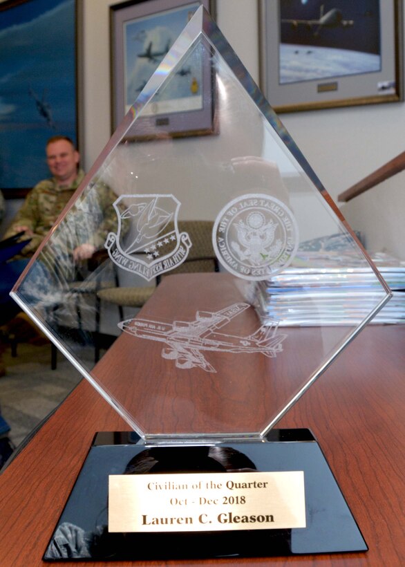 Ms. Lauren Gleason, 507th Air Refueling Wing operations and protocol chief, is recognized by the wing Commander, Col. Miles Heaslip, with the 2018 Civilian of the Quarter award for the fourth quarter during a civilian all-call May 9, 2019, at Tinker Air Force Base, Oklahoma. (U.S. Air Force photo by Tech. Sgt. Samantha Mathison)