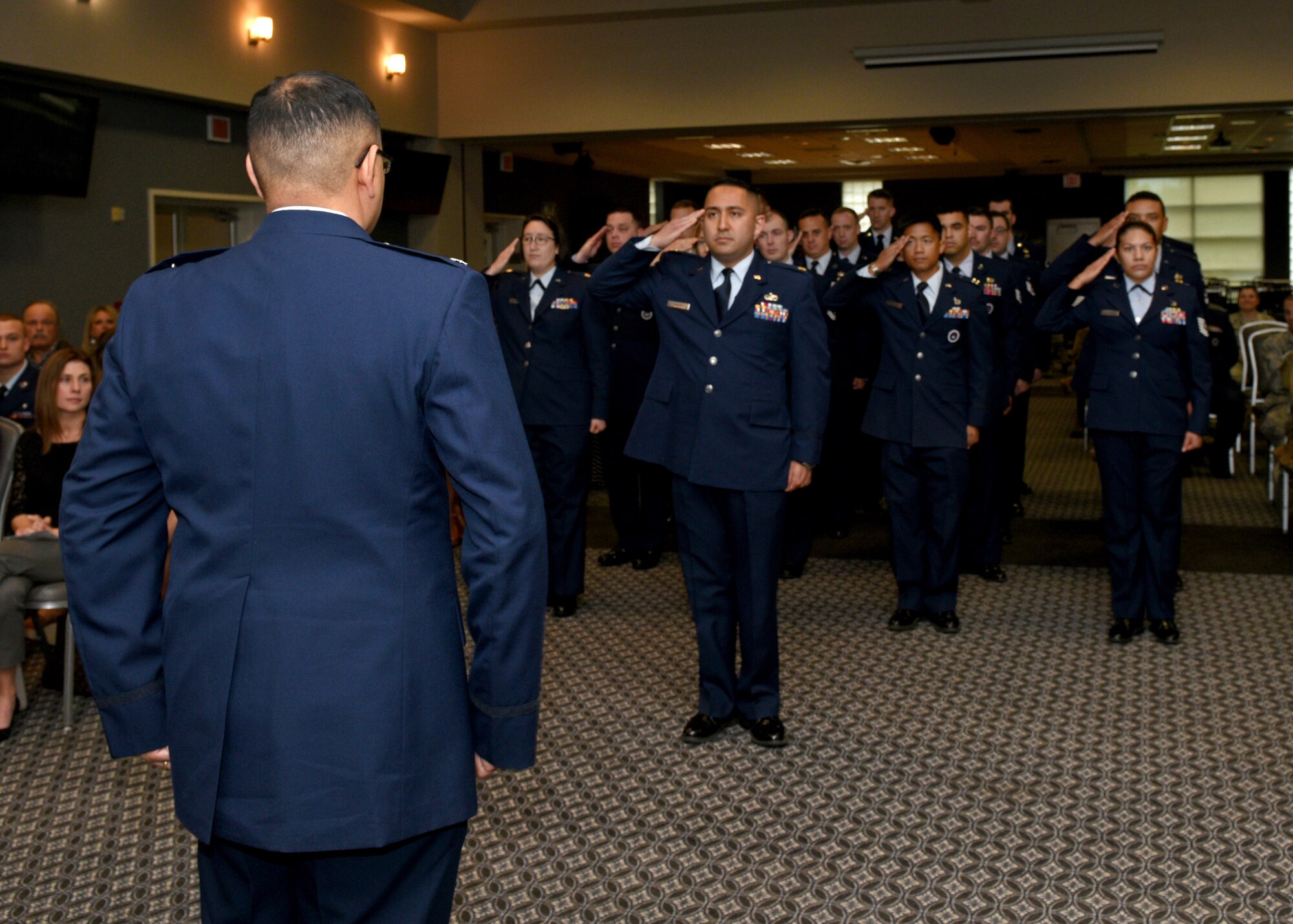 U.S. Air Force Lt. Col. David Sarabia, outgoing 313th Training Squadron commander, receives a final salute from the personnel of the 313th Training Squadron during a change-of-command ceremony at the event center on Goodfellow Air Force Base, Texas, May 10, 2019. In October of 2018, the need for advanced Intelligence, Surveillance, and Reconnaissance training resulted in the reactivation of the 313th TRS under Sarabia. (U.S. Air Force photo by Airman 1st Class Robyn Hunsinger/released)