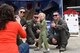 Aircrew assigned to the 432nd Wing at Creech Air Force Base, Nevada, pose for a photo during the Joint Base Andrews 2019 Air and Space Expo at Joint Base Andrews, Maryland, May 11, 2019. The aircrew is made up of a commissioned pilot in command of the aircraft during all phases of flight and an enlisted aviator sensor operator responsible for operating the aircraft’s Multi-Spectral Targeting System. (U.S. Air Force photo by Capt. Annabel Monroe)
