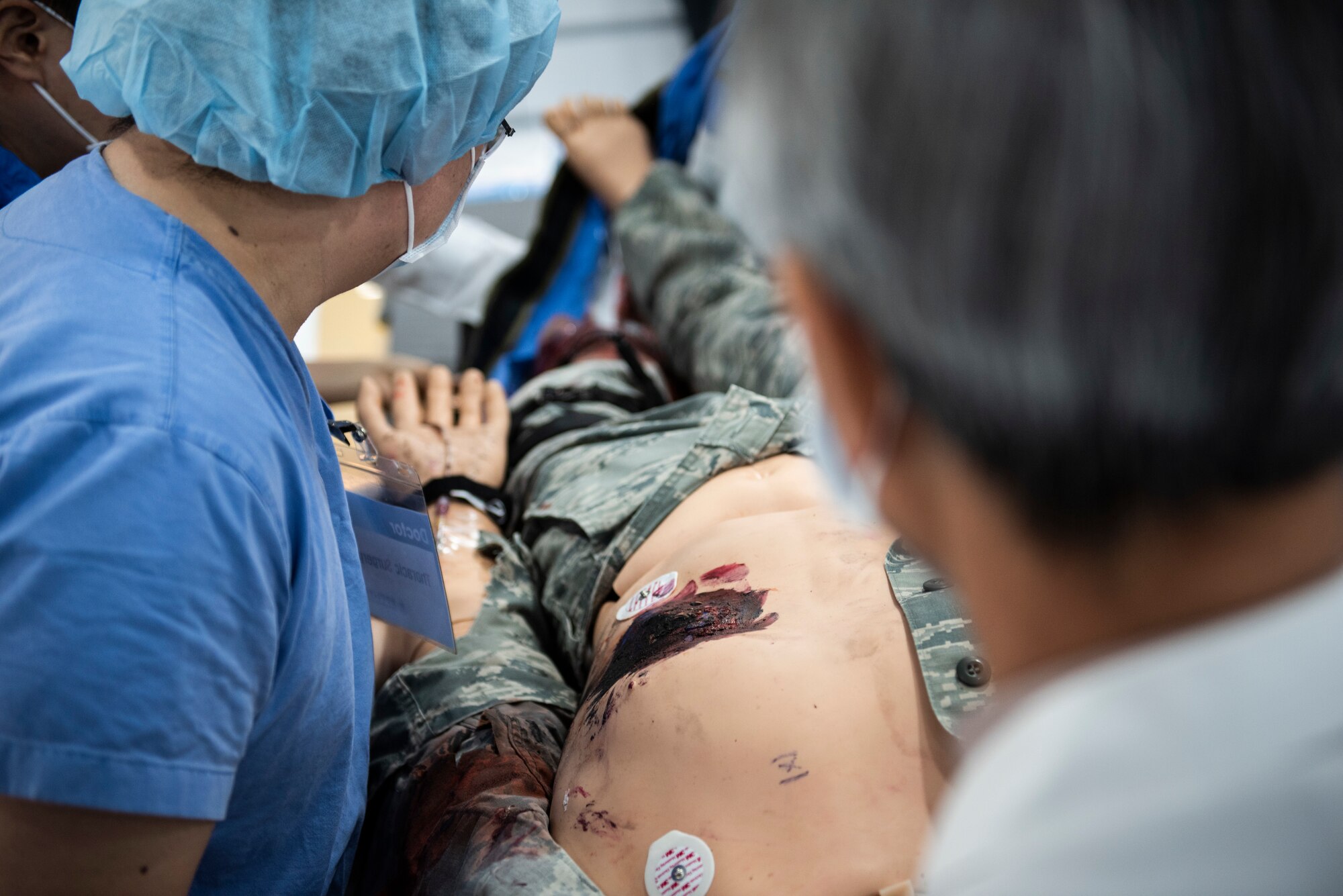Medical staff perform surgery on a simulated patient at Wonkwang University Medical Center, Republic of Korea, May 8, 2019. The 8th Medical Group used an advanced mannequin to hone the skills of the surgical staff and streamline the emergency air lift from Kunsan Air Base to the hospital (U.S. Air Force photo by Senior Airman Stefan Alvarez)
