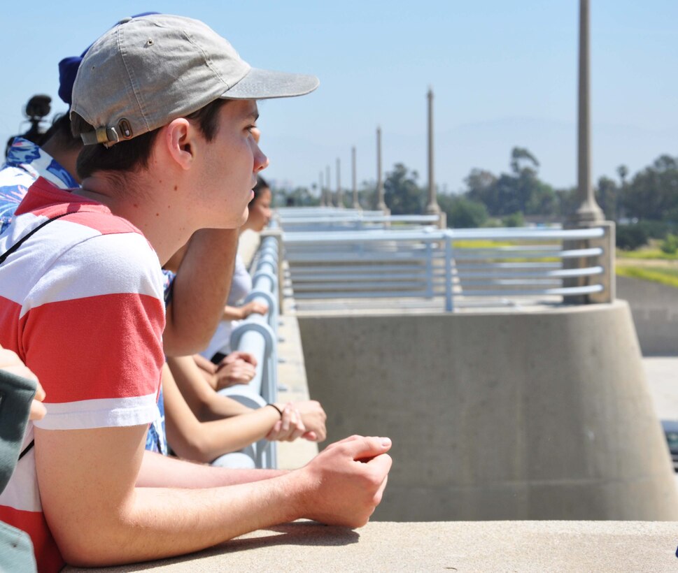 An engineering student with the University of California, Los Angeles looks out over the Sepulveda Dam Spillway April 25 in Los Angeles. The students took a tour of the outside and inside of the spillway to learn about the dam’s operations, hydrology and design.
