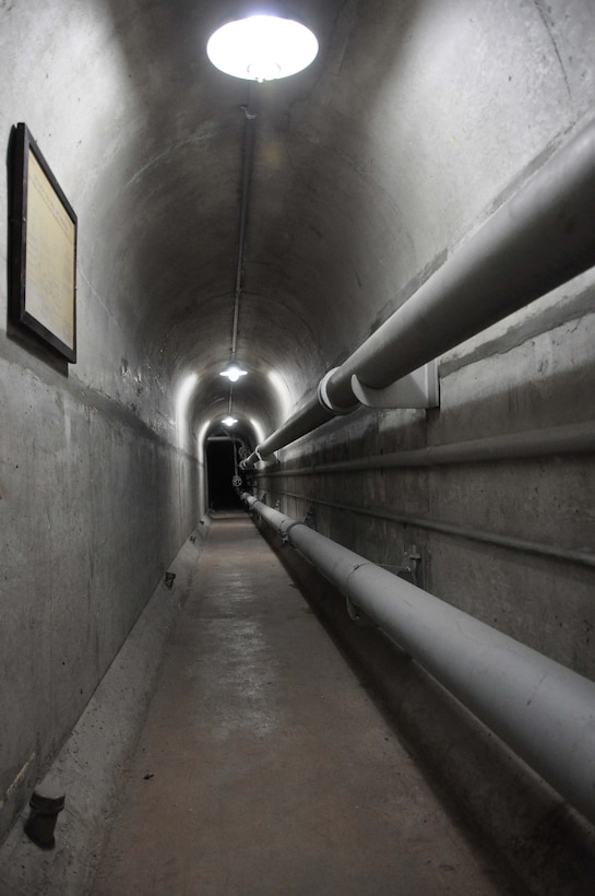 The tunnel underneath the Sepulveda Dam Spillway in Los Angeles extends the entire length of the spillway and part of the road leading from the spillway. Built in 1941, the purpose of Sepulveda Dam is to collect flood runoff from drainage areas upstream, store it temporarily and release it into the Los Angeles River at a rate of about 17,000 cubic feet per second.