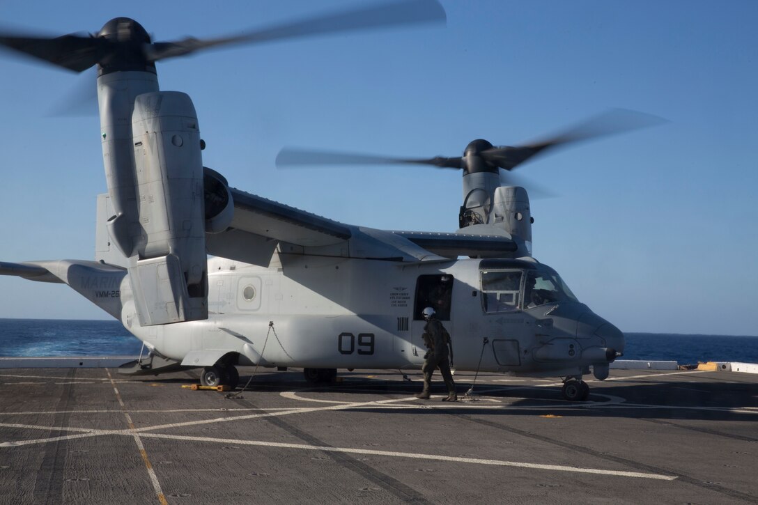 A U.S. Marine Corps MV-22B Osprey with the Special Purpose Marine Air-Ground Task Force-Crisis Response-Africa 19.2, Marine Corps Forces Europe and Africa, sits on the flight deck aboard the USS Arlington (LPD-24) in the Mediterranean Sea, May 6, 2019. SPMAGTF-CR-AF 19.2 conducted deck-landing qualifications to increase proficiency and decrease crisis-response time for contingencies. SPMAGTF-CR-AF is deployed to conduct crisis-response and theater-security operations in Africa and promote regional stability by conducting military-to-military training exercises throughout Europe and Africa. (U.S. Marine Corps photo by Staff Sgt. Mark E. Morrow Jr.)
