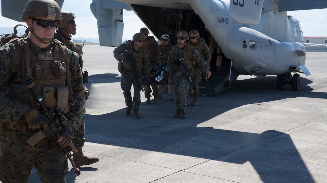 U.S. Marines with the Special Purpose Marine Air-Ground Task Force-Crisis Response-Africa 19.2, Marine Forces Europe and Africa, transport a simulated casualty during a full-mission profile rehearsal at Naval Air Station Sigonella, Italy, May 2, 2019. SPMAGTF-CR-AF 19.2 conducted a full-mission profile rehearsal to increase proficiency and decrease crisis-response time for contingencies. SPMAGTF-CR-AF is deployed to conduct crisis-response and theater-security operations in Africa and promote regional stability by conducting military-to-military training exercises throughout Europe and Africa. (U.S. Marine Corps photo by Staff Sgt. Mark E Morrow Jr.)