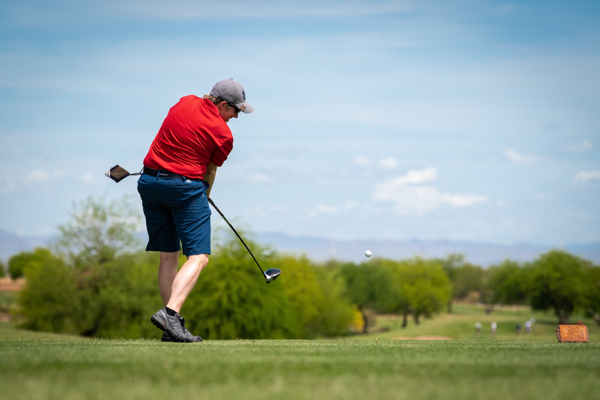 An Armed Forces Golf Tournament participant tees off, May 10, 2019, at Falcon Dunes Golf Course near Luke Air Force Base, Ariz.