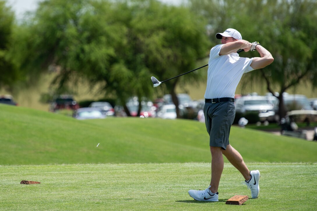 An Armed Forces Golf Tournament participant tees off at hole number 10, May 10, 2019, at Falcon Dunes Golf Course near Luke Air Force Base, Ariz.