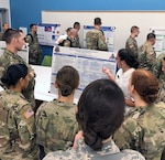 2nd Lt. Emily Chapman, U.S. Military-Baylor Graduate Program in Nutrition, discusses her research of sleep quality, quantity, and cardiovascular disease risk in patients with traumatic limb loss at the 2019 Graduate School Research & Education Symposium at the University of Texas Health Science Center San Antonio May 7 and 8.