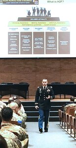 Capt. Paul Rosbrook, U.S. Military-Baylor Graduate Program in Nutrition instructor, addresses an audience of more than 500 allied health graduate students, faculty and staff at the 2019 Graduate School Research & Education Symposium.  Rosbrook presented on the Holistic Health & Fitness System and its effects on allied health professions, future research, and clinical practice.