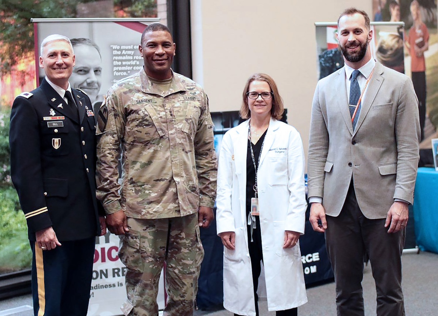 (From left) Col. Skip Gill, Dean of the U.S. Army Medical Department Center and School, Health Readiness Center of Excellence Graduate School; Maj. Gen. Patrick D. Sargent, commander, AMEDDC&S HRCoE; Dr. Susannah Nicholson, assistant professor and director of trauma research, Department of Surgery, UT Health San Antonio; and Dr. Jeremy Nelson, assistant deputy director, Military Health Institute, UT Health San Antonio.