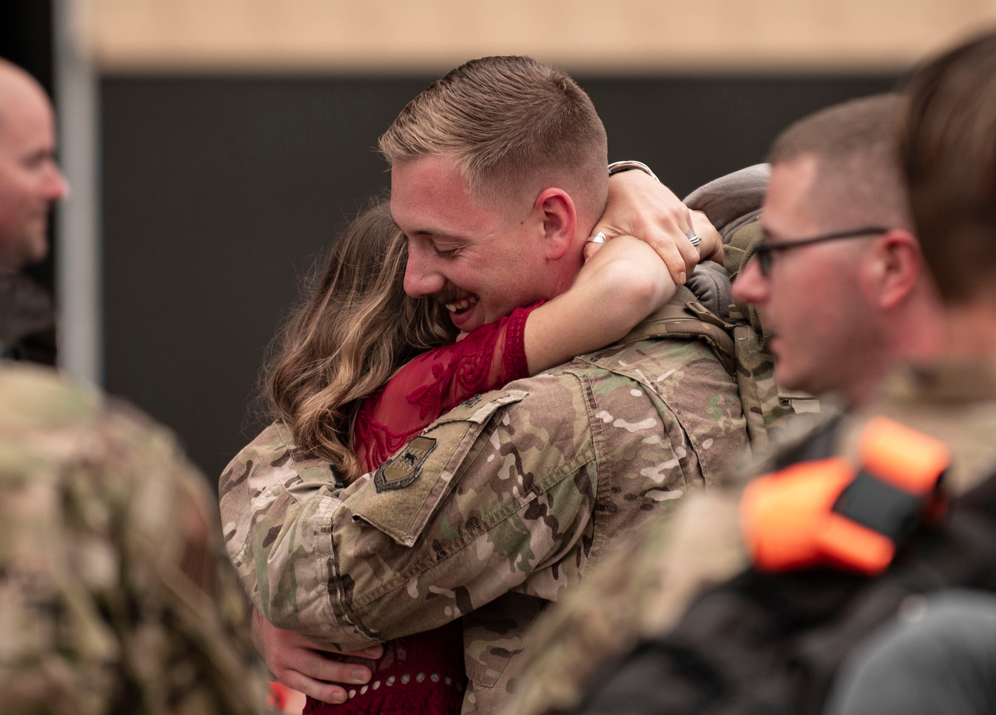 A U.S. Airman hugs a loved one on Shaw Air Force Base, S.C. May 4, 2019.