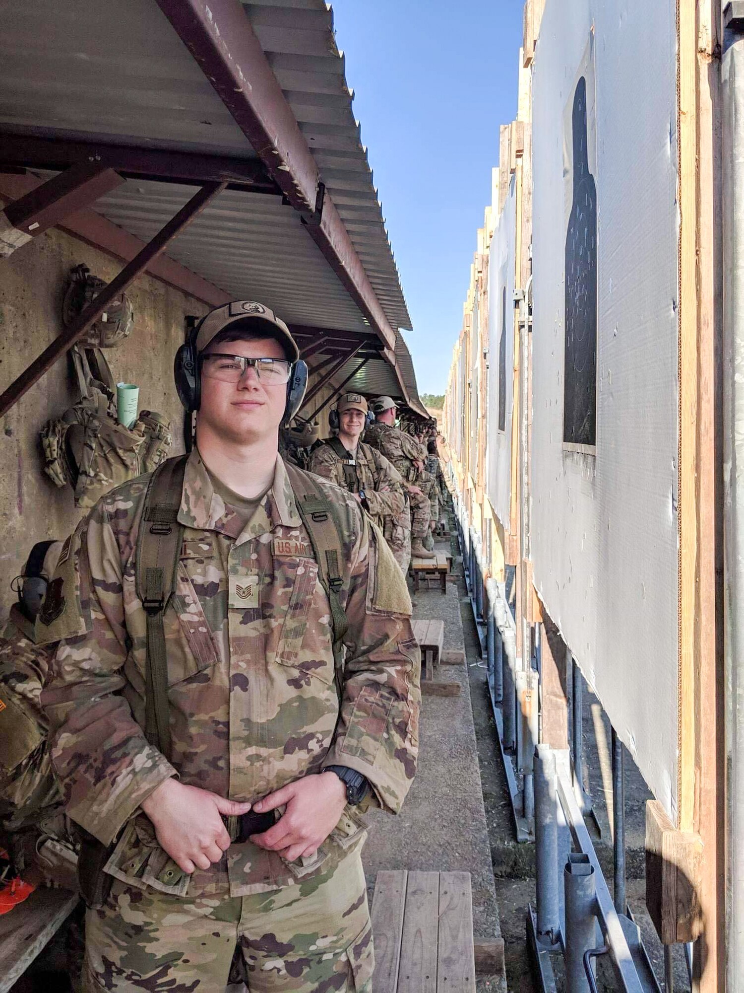 Tech. Sgt. Cameron Riedl, 225th Air Defense Squadron, works on pulling targets during the  2019 Winston P. Wilson Championship at the Robinson Maneuver Training Center, Arkansas, April 10, 2019.  Riedel is a member of the Washington Air National Guard's Marksmanship team competing in the WPW Championship.  (Courtesy photo by Staff Sgt. Shane Key)