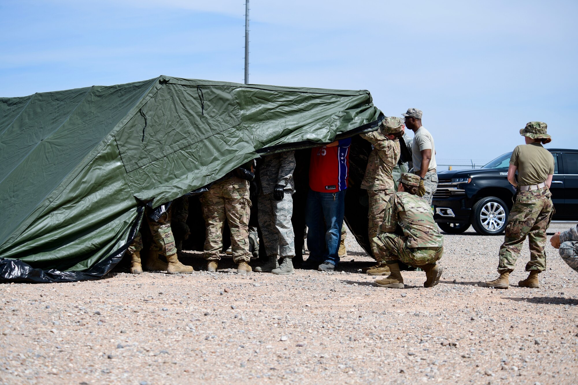 Airmen receive training on how to properly and safely setup a tent during the Combat Support Wing exercise, April 29, 2019, at Fort Bliss, Texas. The CSW concept provides Airmen with the training and ability to deliver dominant airpower more effectively and efficiently anywhere in the world. (U.S. Air Force photo by Senior Airman Kenneth Boyton)