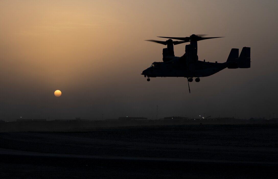 A U.S. Marine MV-22 Osprey with the 22nd Marine Expeditionary Unit prepares to land after finishing helicopter support team training during Marine Expeditionary Unit Exercise. The Marines, with Marine Medium Tiltrotor Squadron 264 (Reinforced) and Combat Logistics Battalion 22, participated the training to build and sharpen their skills in order to maintain combat readiness. Marines and Sailors with the 22nd MEU and Kearsarge Amphibious Ready Group are currently deployed to the U.S. 5th Fleet area of operations in support of naval operations to ensure maritime stability and security in the Central region, connecting the Mediterranean and the Pacific through the western Indian Ocean and three strategic choke points. (U.S. Marine Corps photo by Sgt. Aaron Henson)