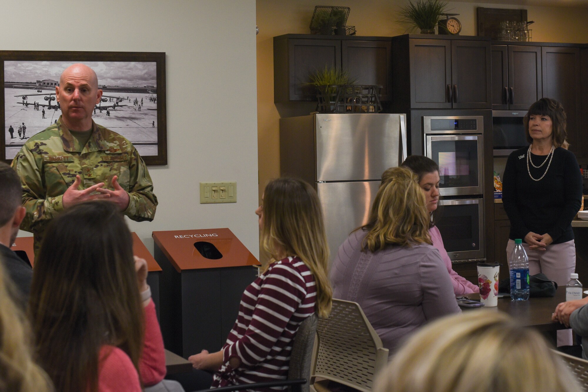 Maj. Gen. Sam Barrett, 18th Air Force commander and his wife, Mrs. Kelly Barrett, meet with Key Spouses of McConnell Air Force Base, Kan. May 2, 2019. The Key Spouses are chosen by the Squadron commander to offer assistance to families during crisis and provide family readiness information. (U.S. Air Force photo by Airman 1st Class Alexi Myrick)