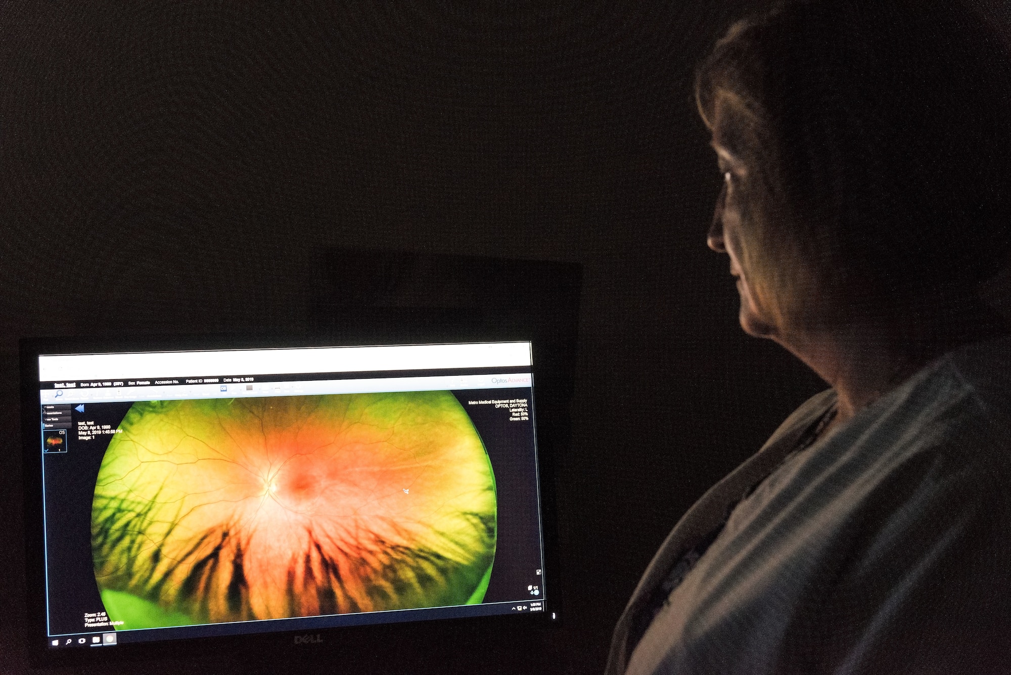 Jennifer Freeman, 436th Aerospace Medicine Squadron ophthalmic technician, views an image of a patient’s eye captured during a retinal examination May 8, 2019, at the Optometry Clinic on Dover Air Force Base, Del. Captured images of each eye enable optometry personnel to inspect the optic nerve, blood vessels and retina. (U.S. Air Force photo by Roland Balik)