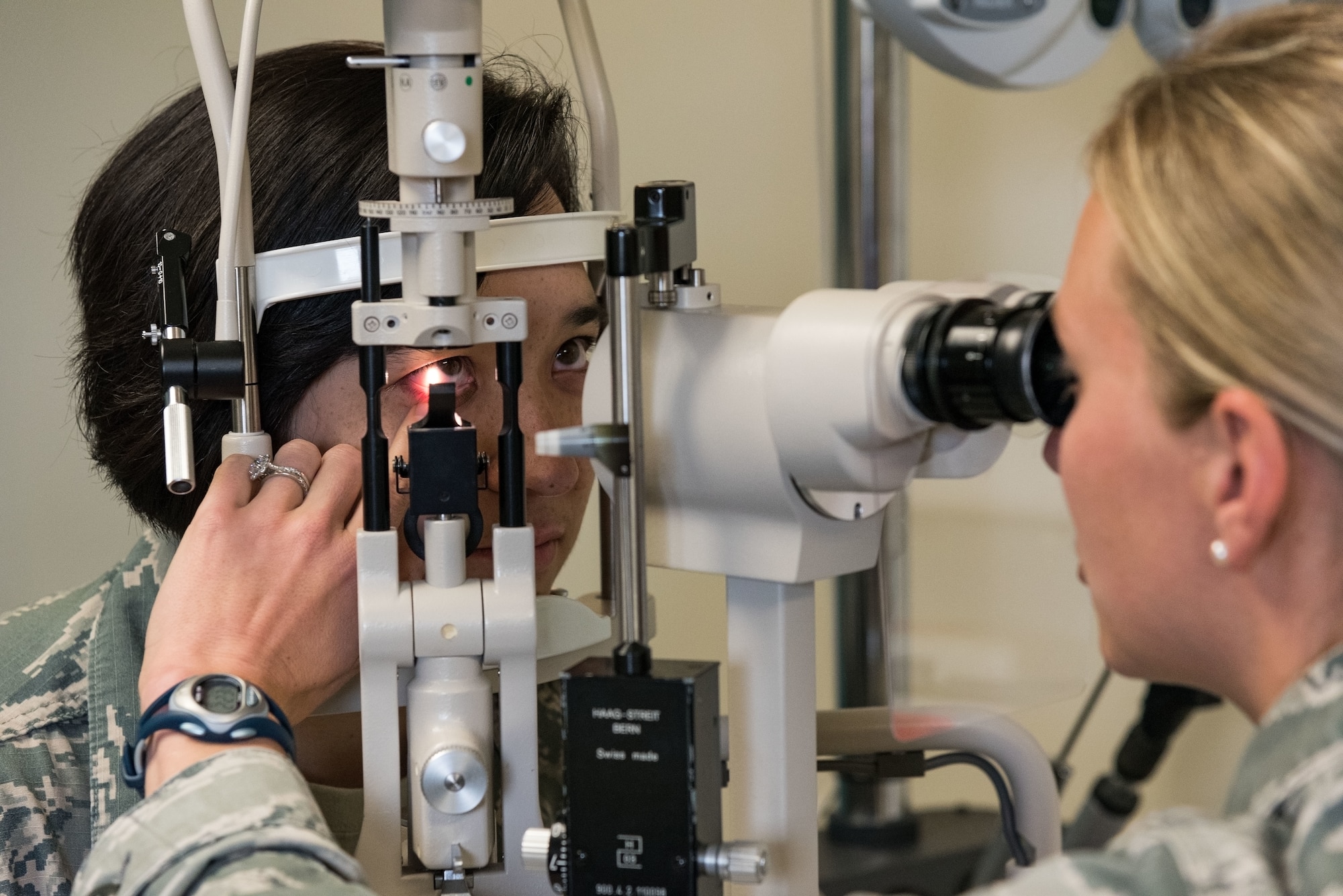 Maj. Carli Murphy, 436th Aerospace Medicine Squadron optometry flight commander, performs a slit lamp examination on Staff Sgt. Courtney Herrera, 436th Medical Support Squadron radiologic technologist, during a routine eye examination May 8, 2019, at the Optometry Clinic on Dover Air Force Base, Del. The slit lamp allowed Murphy to examine the health of Herrera’s eyes by viewing the optic nerves, blood vessels, macula, retina, cornea, iris and eye lids. (U.S. Air Force photo by Roland Balik)