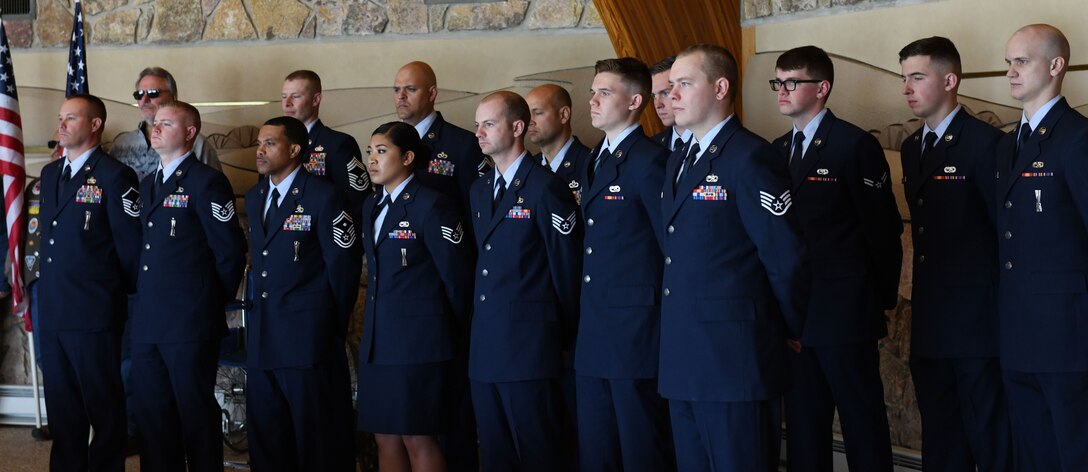 Ellsworth Airmen stand in formation to pay their respects to former Pfc. Carroll E. Lonas before he was laid to rest at the Black Hill National Cemetery in Sturgis, S.D., May 9, 2019. Lonas was captured by the Germans during World War II. He was held as a prisoner of war for 14 months prior to his escape. (U.S. Air Force photo by Airman 1st Class Christina Bennett)