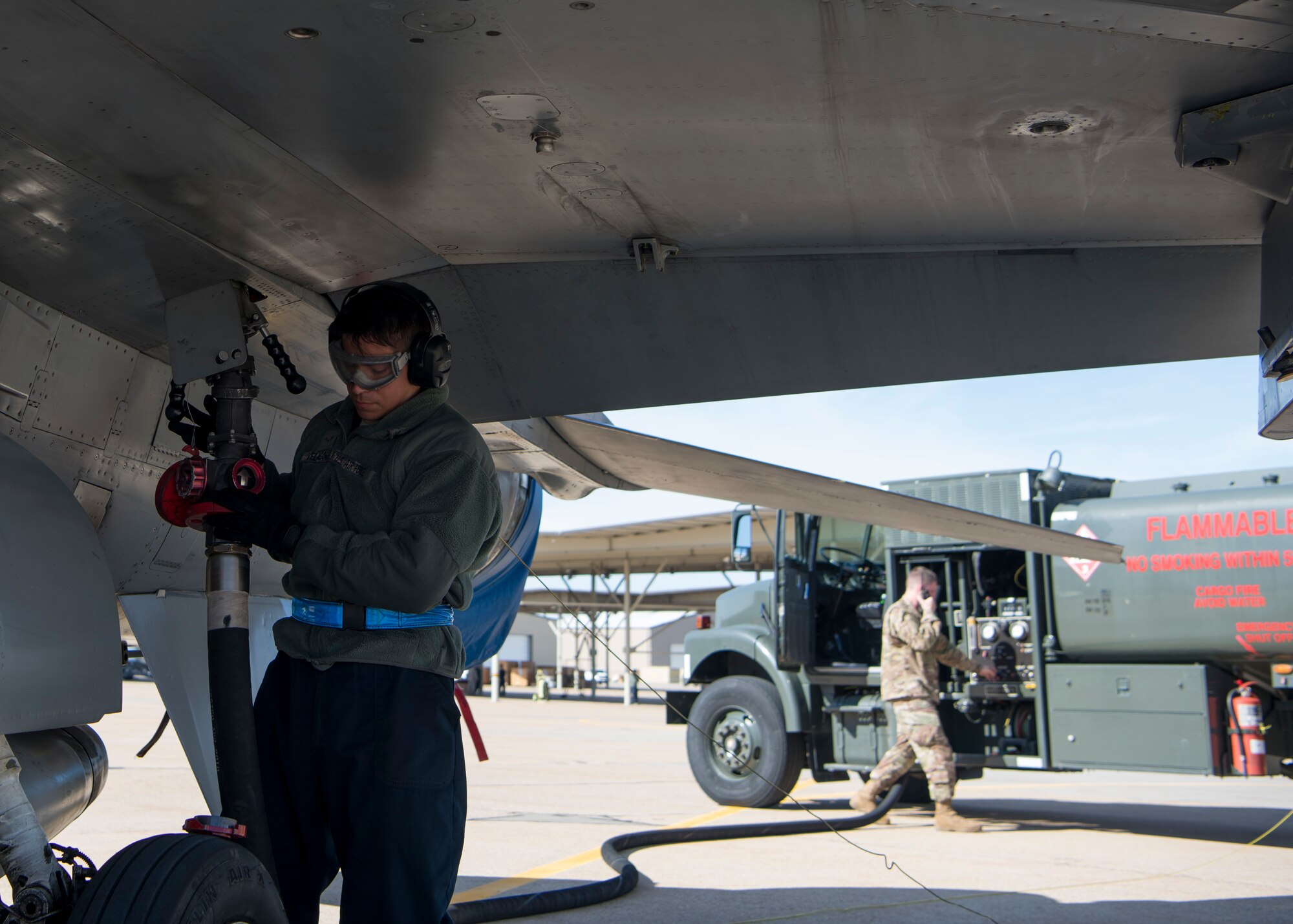 A Dedicated Crew Chief from the 311th Aircraft Maintenance Unit refuels a 311th Fighter Squadron F-16 Viper, April 30, 2019, on Hill Air Force Base, Utah. Between April 22 and May 3, the 311th FS conducted 174 sorties in support of student pilot training and dissimilar air combat training with the F-35 Lightning II. (U.S. Air Force photo by Staff Sgt. BreeAnn Sachs)