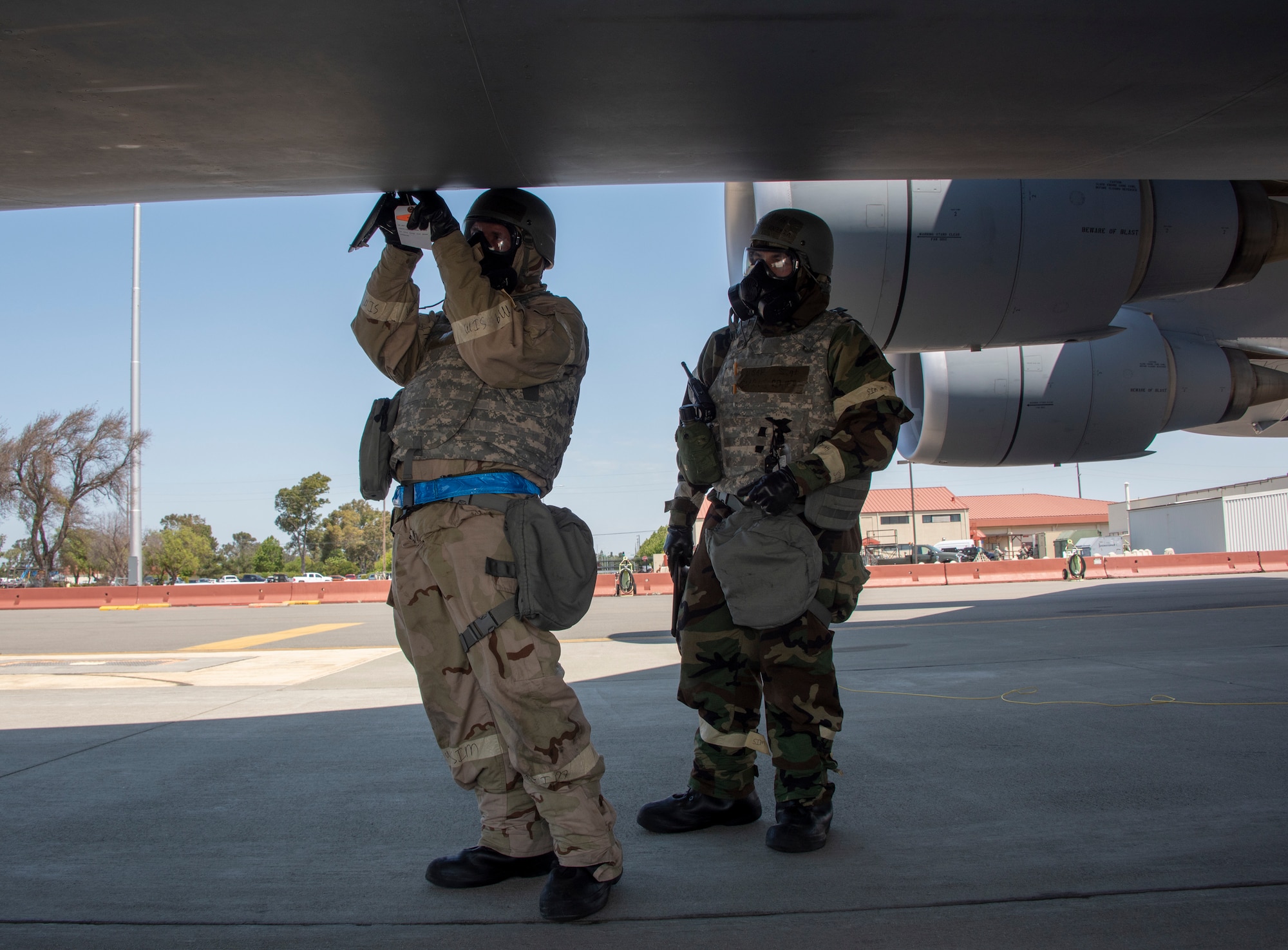 U.S. Air Force Staff Sgt. Corey Fugate, left, and SSgt. Christopher Renteria, right, both with the 349th Aircraft Maintenance Squadron, preform liquid oxygen service on a C-5M Super Galaxy during a readiness exercise at Travis Air Force Base, California, May 9, 2019. The base conducted a week-long exercise that evaluated Travis’ readiness and ability to execute and sustain rapid global mobility around the world. (U.S. Air Force photo by Heide Couch)