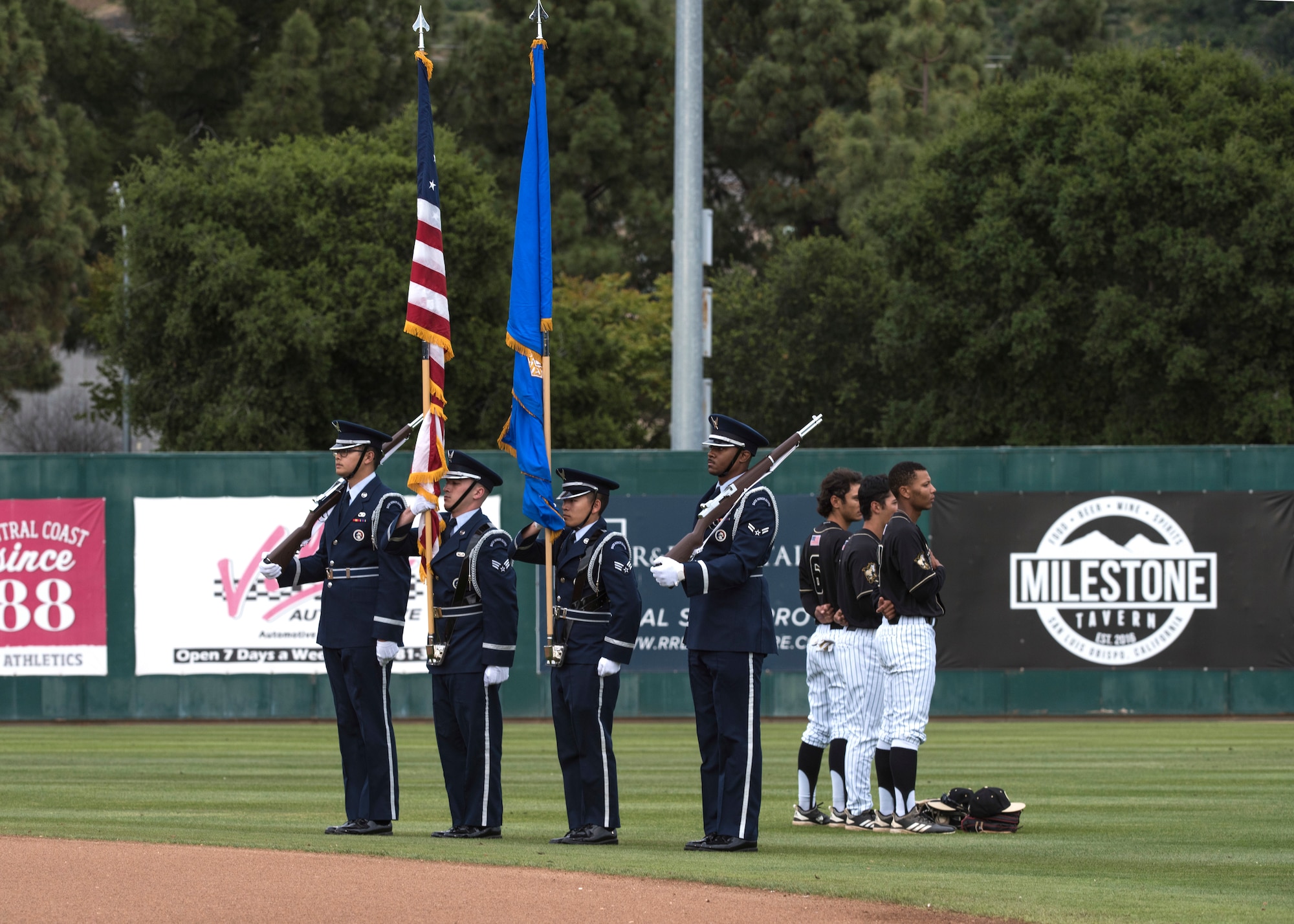 Members of the Vandenberg Air Force Base Honor Guard present the colors during the California Polytechnic State University Hero’s Night baseball game May 7, 2019, at the Alex G. Spanos Stadium in San Luis Obispo, Calif. Since the “Hero’s Night” game was dedicated to honor all military, law enforcement and fire personnel, the Vandenberg AFB Honor Guard presented the colors to emphasis military relationships within the local community. (U.S. Air Force photo by Airman 1st Class Aubree Milks)