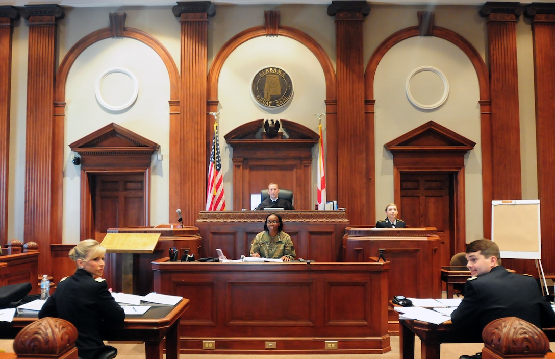 Alabama National Guard Trial Defense Service and 167th Judge Advocate General’s Corps section culminated yearlong training exercise, August 7–8, 2018, at Calhoun County Courthouse, Anniston, Alabama, with mock trial, going through entire legal process that Uniformed Code of Military Justice would require (U.S. Army National Guard/Katherine Dowd)