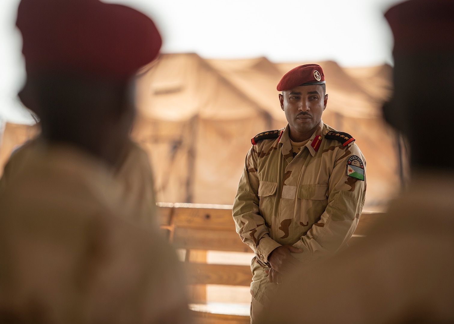 Djiboutian army commander of elite military force Rapid Intervention Battalion listens during course graduation, taught by U.S. Soldiers with 1-26 Infantry Battalion, 2nd Brigade Combat Team, 101st Airborne, at training location near Djibouti, March 7, 2019 (U.S. Air Force/Shawn Nickel)