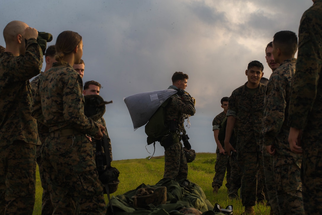 U.S. Marine Corps parachute riggers conduct air delivery operations April 29, 2019 at Ie Shima, Okinawa, Japan. 3rd Air Delivery Platoon, Landing Support Company, Combat Logistics Regiment 3, 3rd Marine Logistics Group, conduct regular training to certify their Marines in various airborne resupply missions. (U.S. Marine Corps photo by Lance Cpl. Isaiah Campbell)