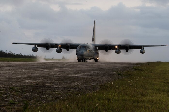 U.S. Marines with VMGR-152 support parachute riggers in air delivery operations using a KC-130 Hercules April 29, 2019 at Ie Shima, Okinawa, Japan. Parachute riggers are with 3rd Air Delivery Platoon, Landing Support Company, Combat Logistics Regiment 3, 3rd Marine Logistics Group conduct regular training to certify their Marines in various airborne resupply missions. (U.S. Marine Corps photo by Lance Cpl. Isaiah Campbell)